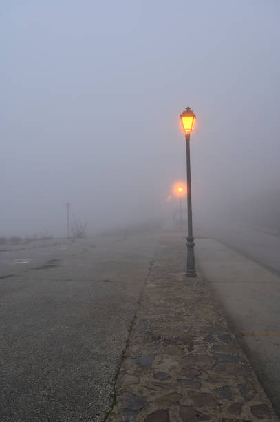 istock day of intense fog in town 1356201767