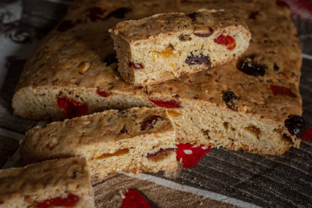 istock Christmas stollen with candied fruits and nuts 1356205379