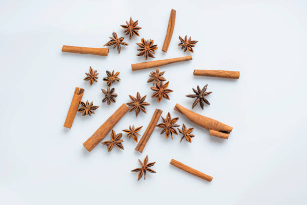 Cinnamon, star anise and  on a white background stock photo