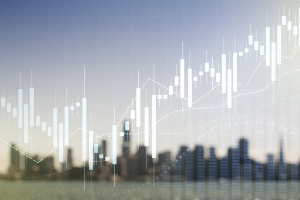 istock Multi exposure of virtual creative financial chart hologram on blurry cityscape background, research and analytics concept 1356206538