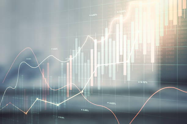istock Abstract virtual financial graph hologram on blurry modern office building background, forex and investment concept. Multiexposure 1356206666