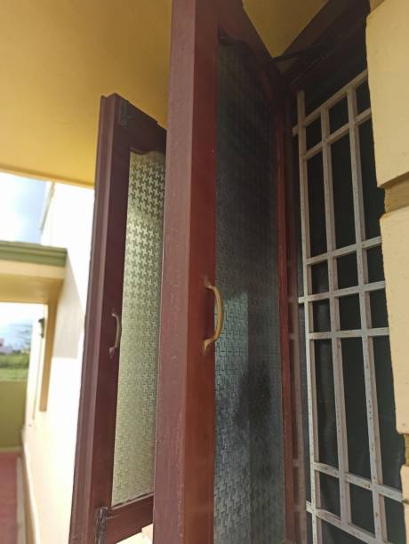 istock old window with glass lid and iron trellis photo 1356208612