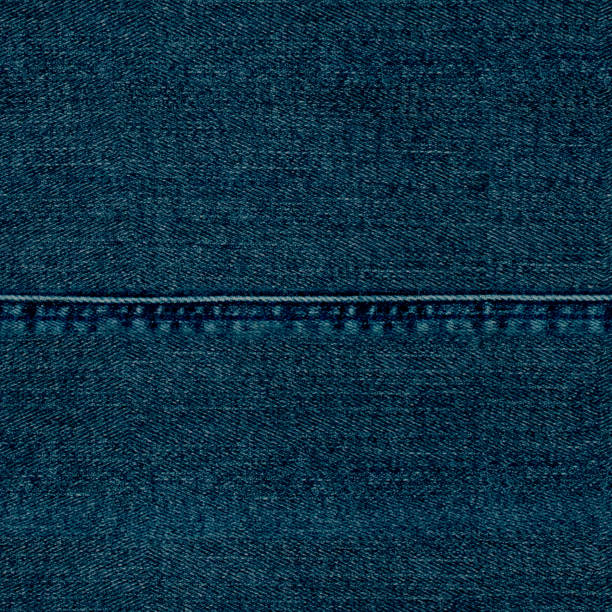 istock Jeans patchwork fashion background. Denim blue grunge textured seamless pattern 1356210232