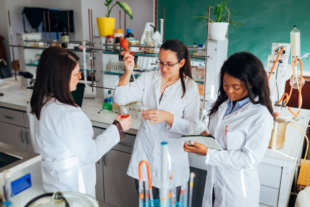 istock Teamwork of women scientists who use a pipette when performing a scientific experiment. 1356210525