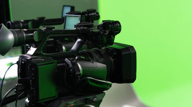 TV camera in a professional chroma key studio. VFX, Livestream, Live stock photo