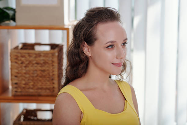 istock Positive Pretty Young Woman 1356213176