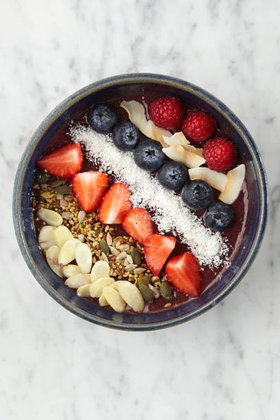 istock COCONUT AND CHIA ACAI BOWL SEEDS AND NUTS 1356214563