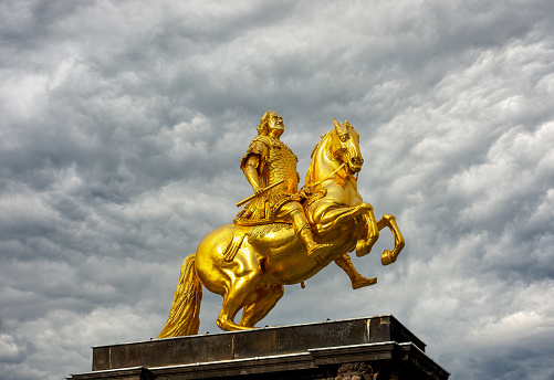 Dramatically picture of the Golden Equestrian Statuette (\