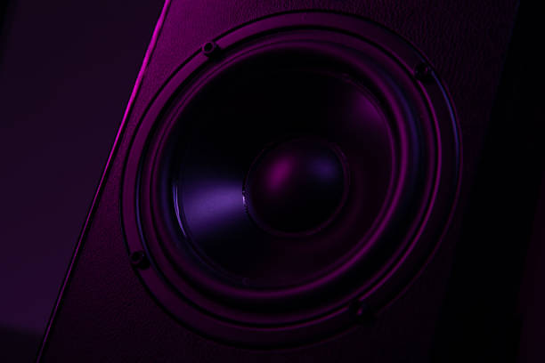 istock speaker close-up on black background with atmospheric lighting 1356215559
