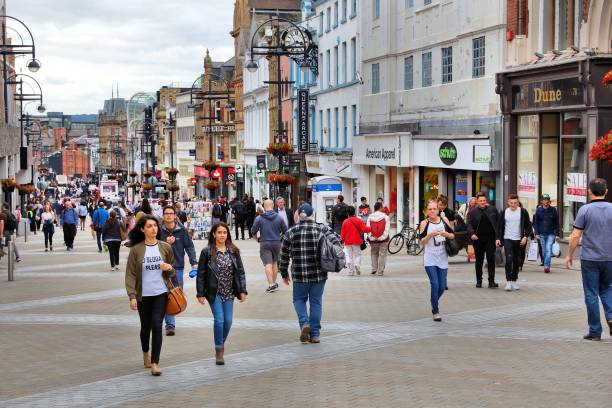 People shop at Briggate street in downtown Leeds, UK. Leeds urban area has 1.78 million population.