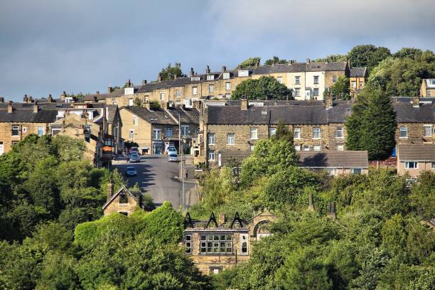 Bradford UK Bradford UK - residential district. Yellow brick homes. west yorkshire stock pictures, royalty-free photos & images