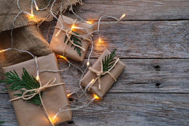 istock Christmas packages wrapped in kraft paper tied with string 1356216916