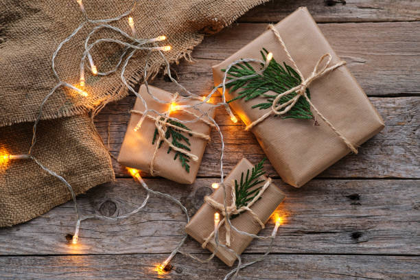 istock Christmas packages wrapped in kraft paper tied with string 1356216921