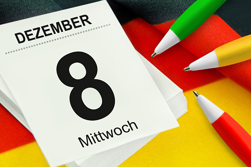 Calendar 2021 December 8  Wednesday and  pencils red green yellow with German flag
