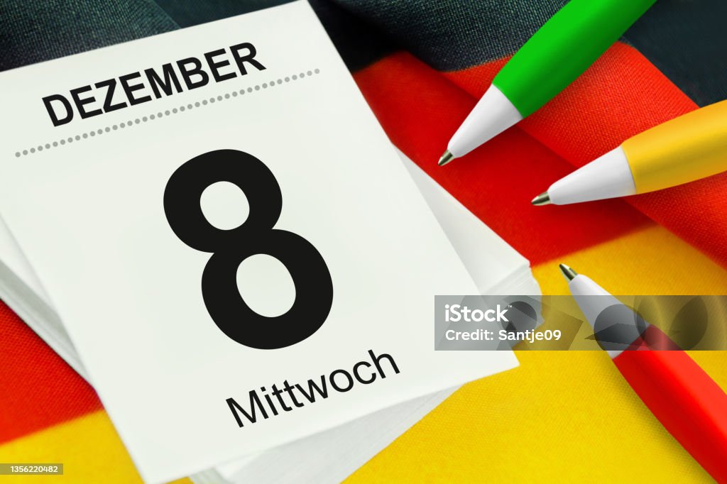 Calendar 2021 December 8  Wednesday and  pencils red green yellow with German flag Agreement Stock Photo