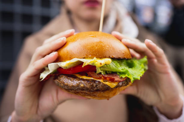 istock Close-up gourmet tasty bacon burger. 1356221780