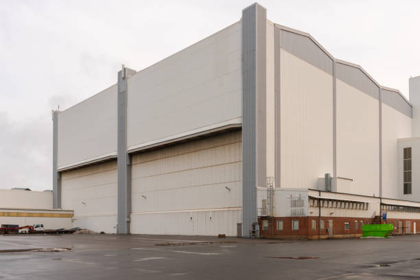 istock Large white construction hall for huge heavy equipment.. 1356228557