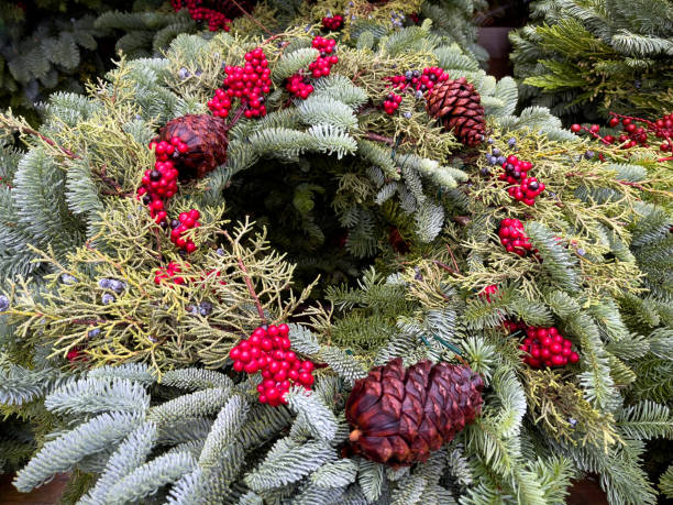 istock Stack of green Christmas wreaths 1356235198