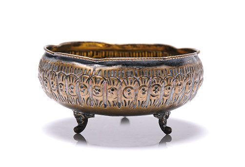 Antique Chinese cast-iron bowl with two dragon handles and gold flakes in enamel.