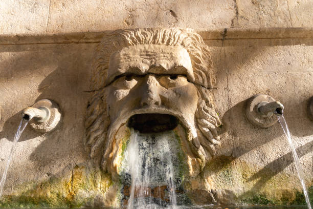 istock sculpture from which water flows in the ancient fountain 1356244974