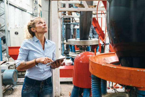istock Engineer working in plastic recycling factory 1356245467