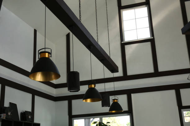 istock Stylish hanging lamps indoors. idea for interior design 1356246443