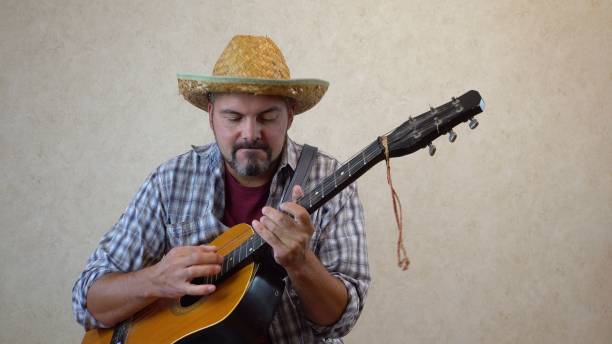 istock A  man playing the guitar gambling 1356246641