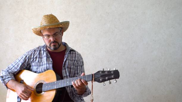 istock A man playing lyric music 1356246677