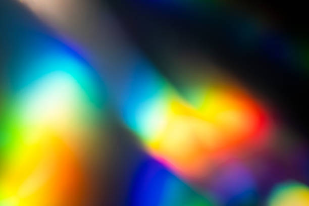 istock colorful rainbow crystal light leaks on black background 1356246939