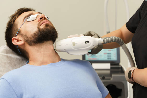 Man during beard photoepilation procedure stock photo