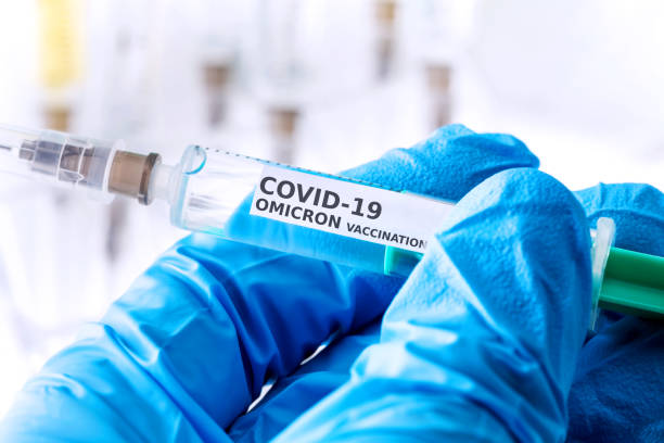covid-19 omicron variant vaccination concept stock photo