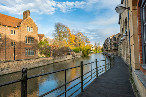 A view down the River Cam from the wooden staging walkway in the city of Cambridge