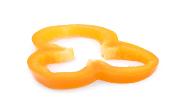 istock Slice of orange bell pepper isolated on white 1356250655