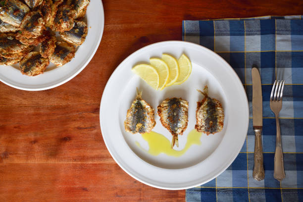on top Image of a plate with a traditional fish dish from Sicily, so-called 