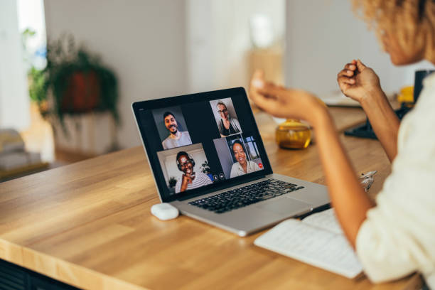 istock Anonymous Afro-American Woman Having a Video Call On a Laptop 1356258343