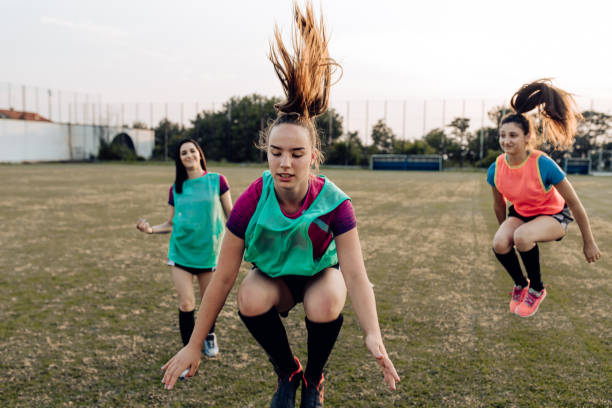 istock Girls warming up for the rugby training 1356263113