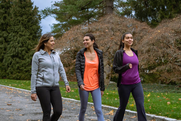 istock Family exercising outdoors 1356263437