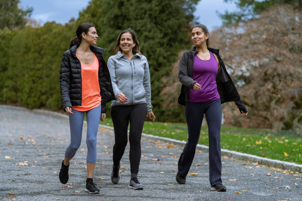 istock Family exercising outdoors 1356263442