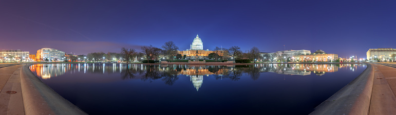 Washington, D.C. at the Capitol Building at night.