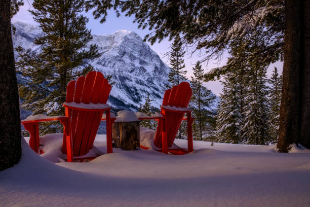 istock Until the Next Summer Season - Red Chairs with Storm Mountain 1356284104