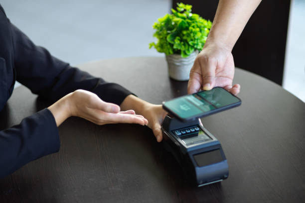 istock Online payment with payment terminal machine. mobile banking application. 1356285032