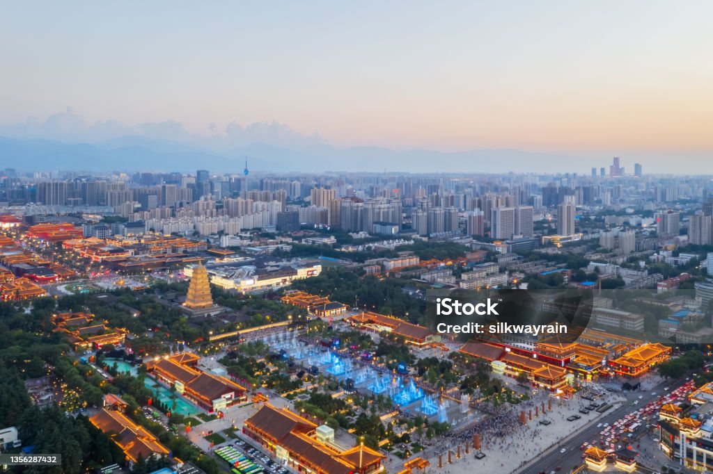 beautiful twilight view of the ancient city of Xi 'an beautiful twilight scene of the ancient city of Xi 'an, aerial view of the giant wild goose pagoda and fountain plaza , China. Xi'an Stock Photo