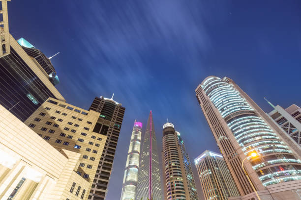 modern financial buildings in shanghai at night, upward view