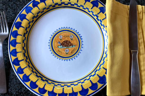 Place Setting with Majolica Plate and Yellow Napkin