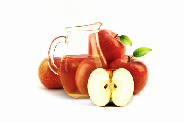 istock Fresh apple juice and apple, half apple cross section 1356294360