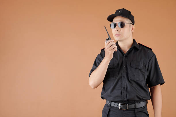 黒い制服を着た警備員 - honor guard ストックフォトと画像