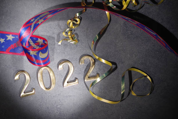 istock Happy New Year. Symbol from number 2022 on abstract background 1356298412