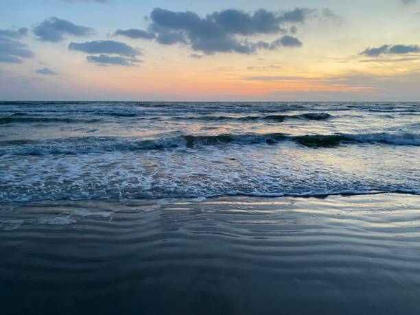 istock Beautiful sunset on beach summer 1356301575