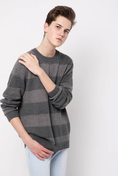 istock Attractive teenage boy posing in studio 1356301712