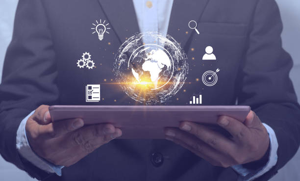 istock Businessman holding a tablet, displaying information, networking online, to the world, communication concept, use of technology for work, business, online, information search, global and big data. 1356302231